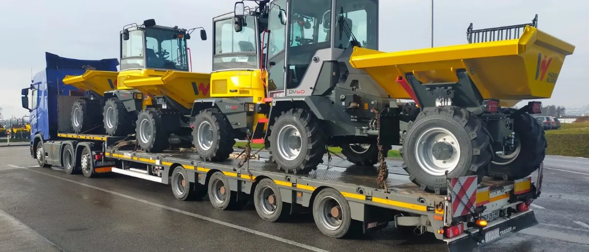 Transport încărcătoare frontale Wacker Neuson pe platformă agabaritică